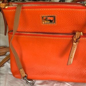 Dooney and Burke orange cross body bag
